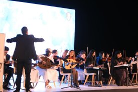 The participation of the orchestra of the students of the Academy of Fine Arts in Fujairah at the ceremony held by the Municipality of Fujairah at the meeting of municipal employees.